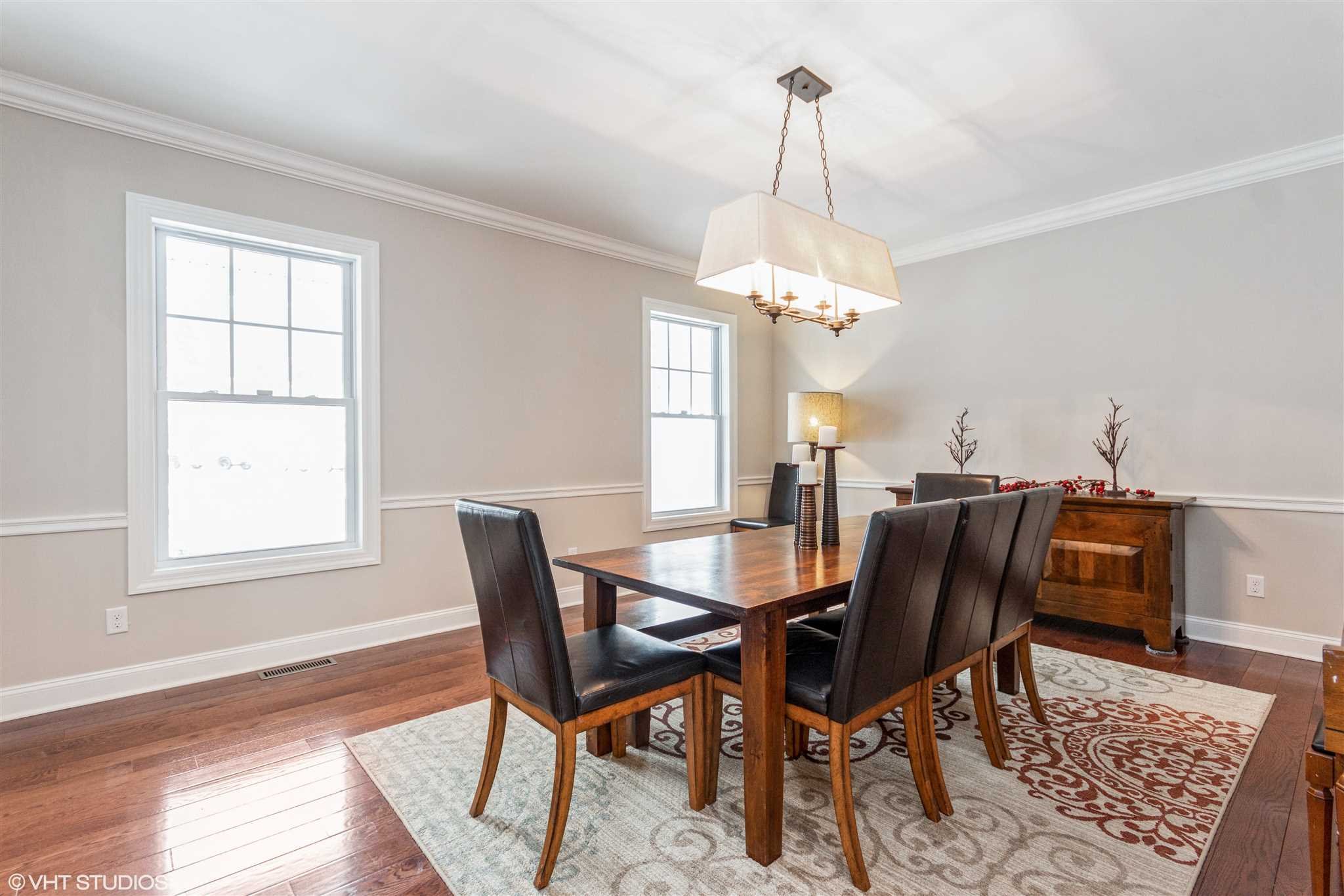 25 Riding Ridge Trail Beacon, NY 12508 - Photo 9 of 25 a view of a dining room with furniture and wooden floor