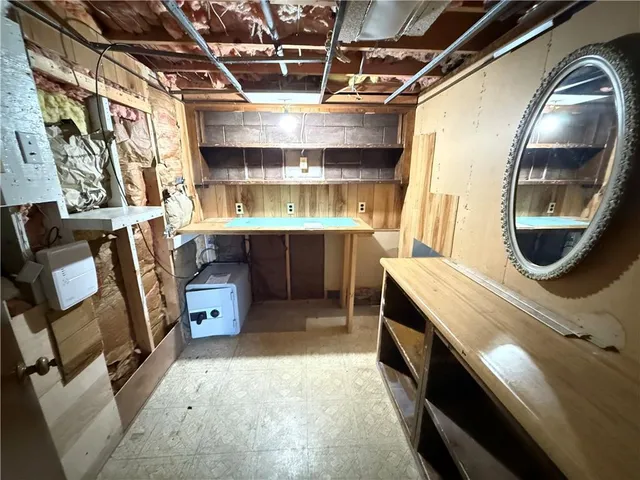 a bathroom with a sink and mirror