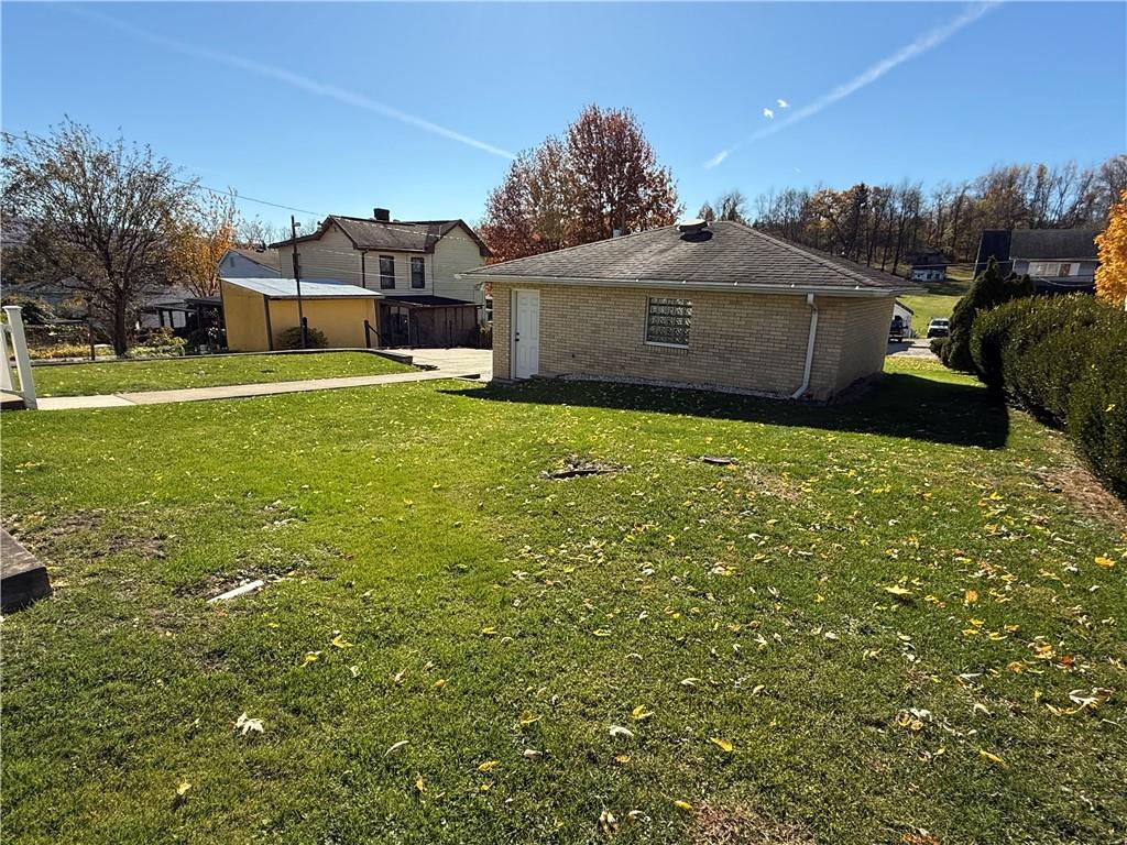 18 Water Street Smithfield, PA 15478 - Photo 26 of 26 a front view of a house with a yard
