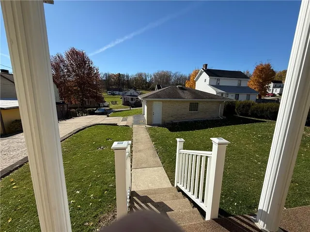 a house view with a garden space