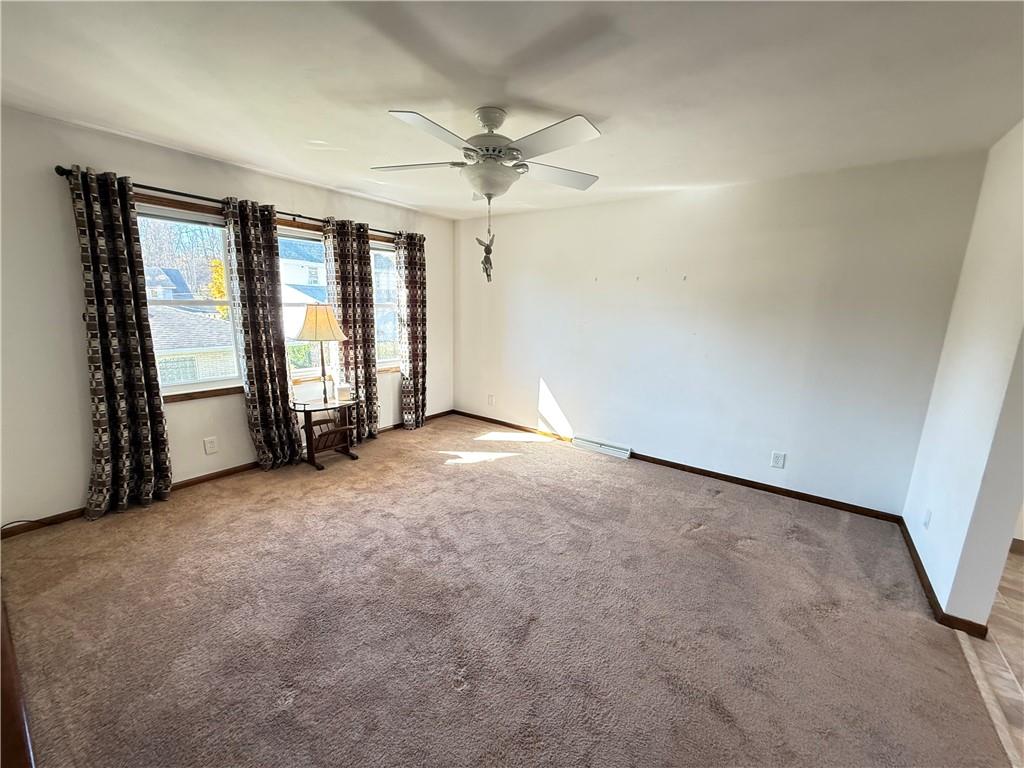 18 Water Street Smithfield, PA 15478 - Photo 6 of 26 an empty room with windows and fan