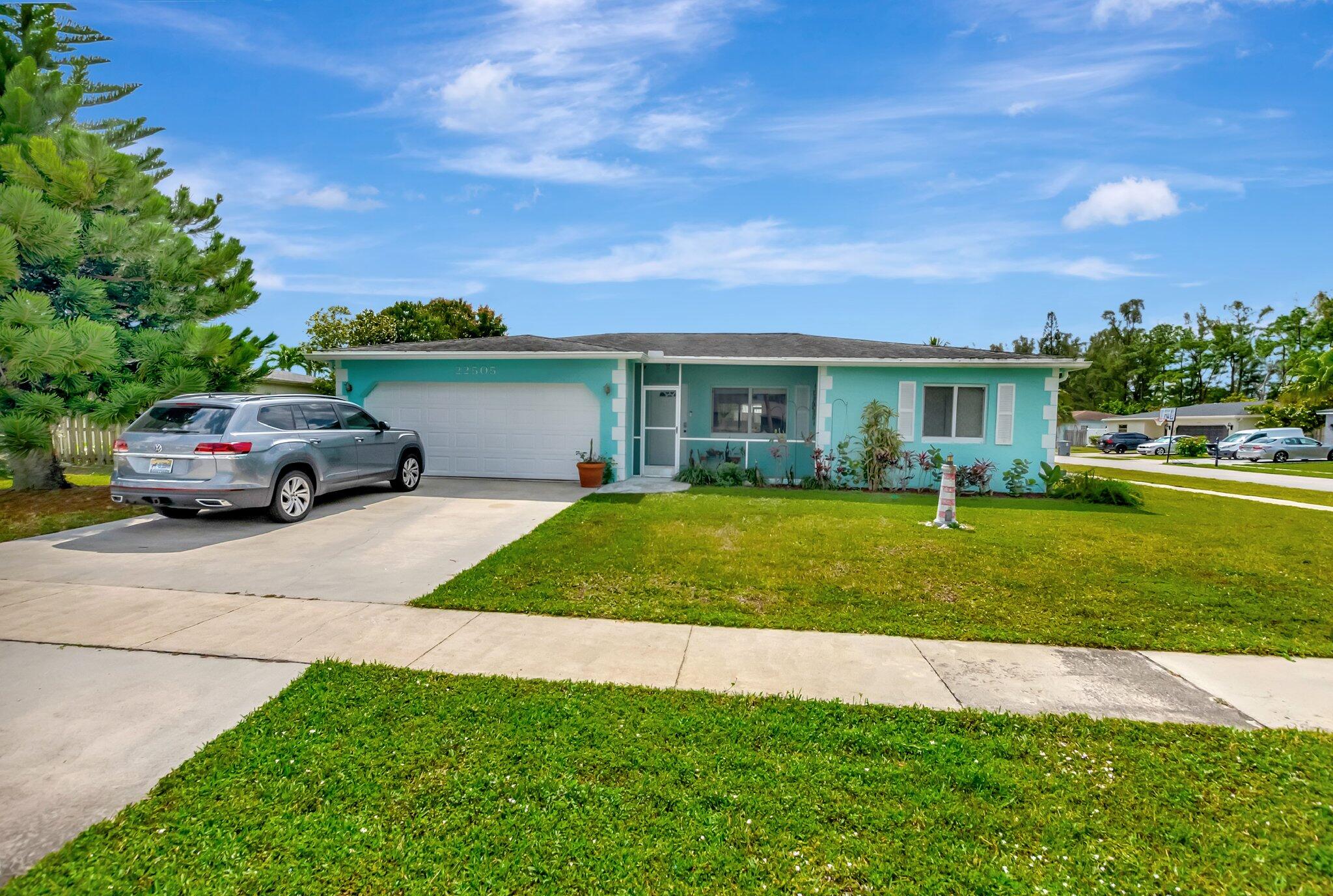 22505 Labrador Street Boca Raton, FL 33428 - Photo 1 of 35 a house view with a garden space