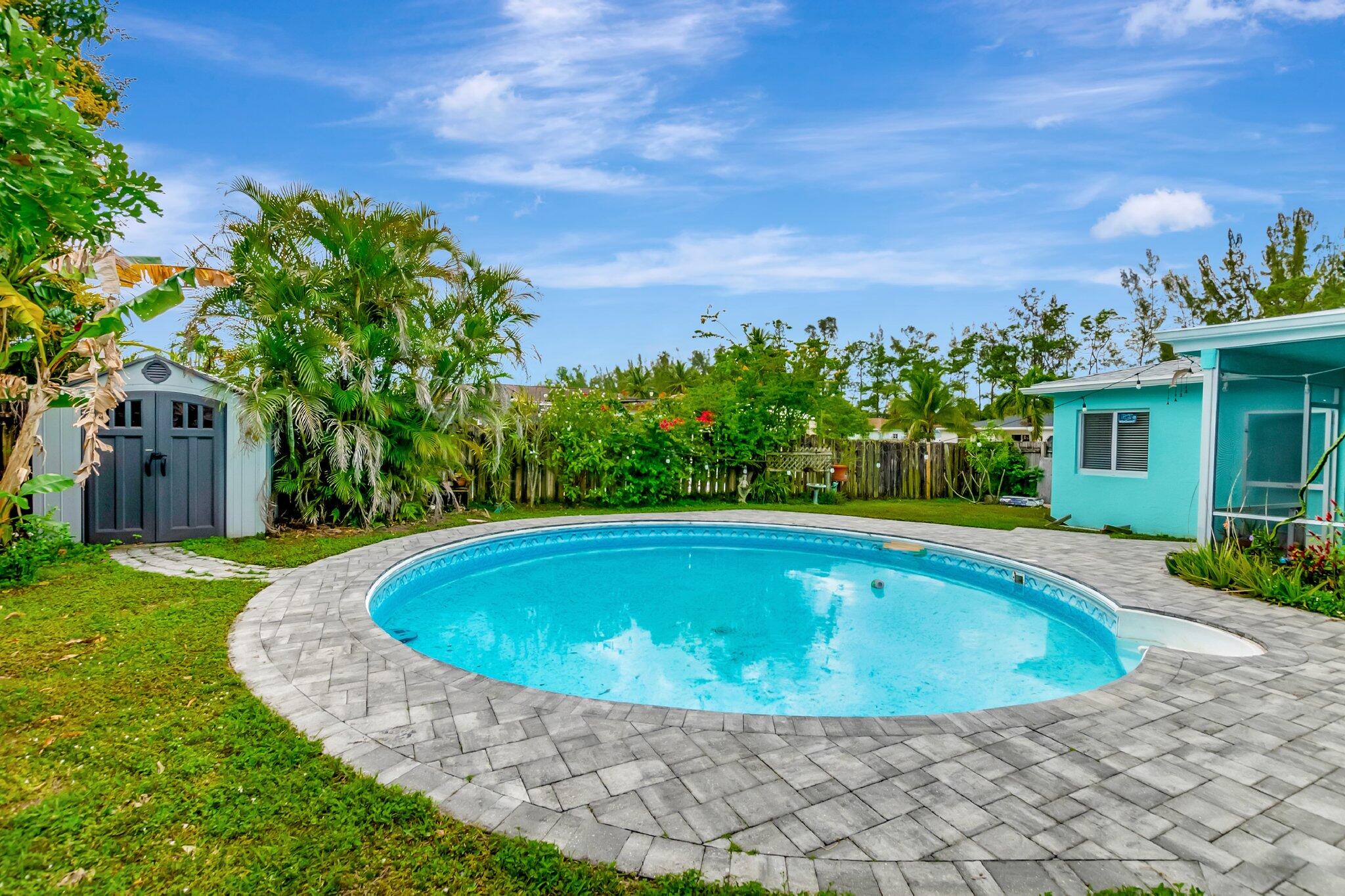 22505 Labrador Street Boca Raton, FL 33428 - Photo 32 of 35 a view of swimming pool with garden