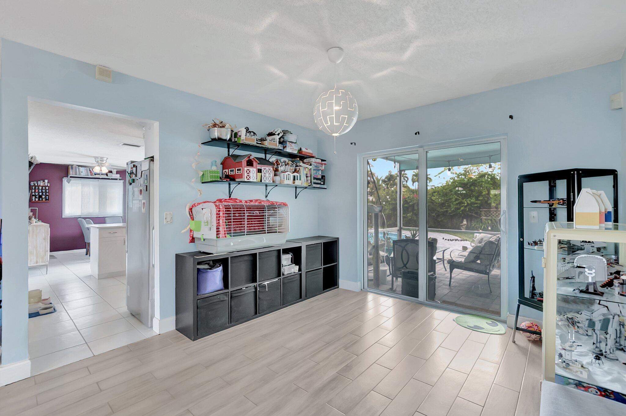 22505 Labrador Street Boca Raton, FL 33428 - Photo 8 of 35 a view of a living room and dining room