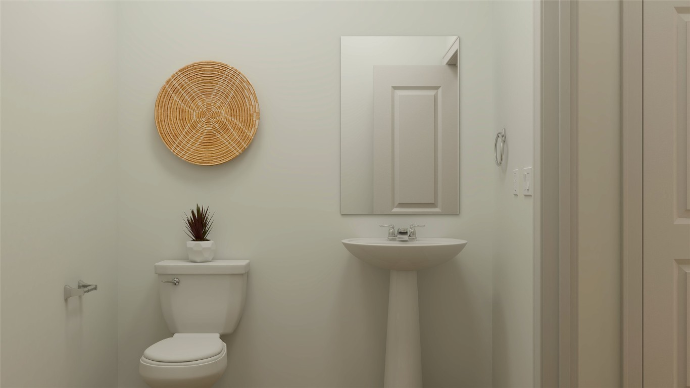 1109 Nesting Bird Drive Georgetown, TX 78628 - Photo 16 of 23 a bathroom with a toilet and a sink