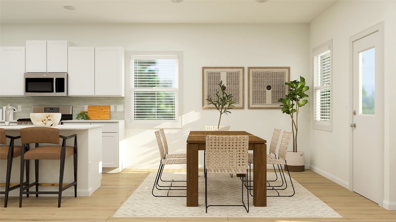 1109 Nesting Bird Drive Georgetown, TX 78628 - Photo 7 of 23 a dining room with furniture and window