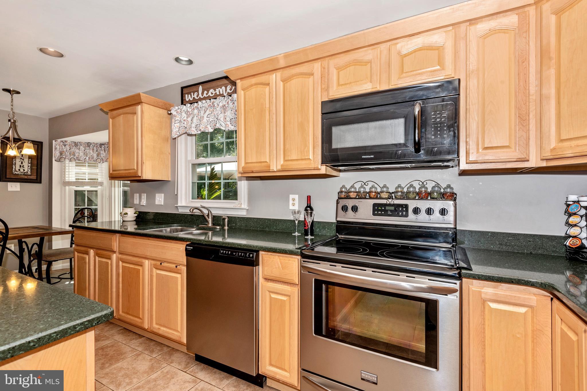 10725 Game Preserve Road Gaithersburg, MD 20879 - Photo 20 of 50 MAIN LEVEL-KITCHEN WITH LAUNDRY ROOM