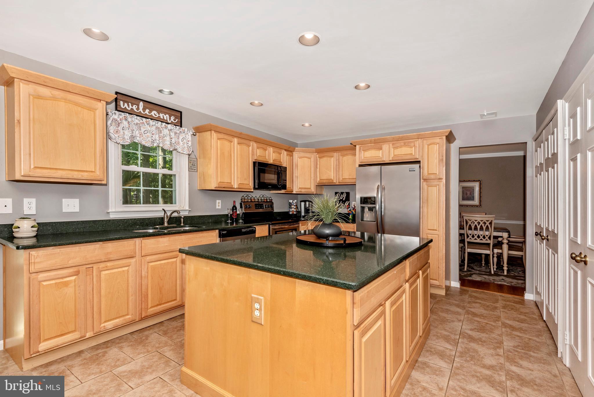 10725 Game Preserve Road Gaithersburg, MD 20879 - Photo 5 of 50 MAIN LEVEL-EAT-IN KITCHEN W/ OVER-SIZED ISLAND