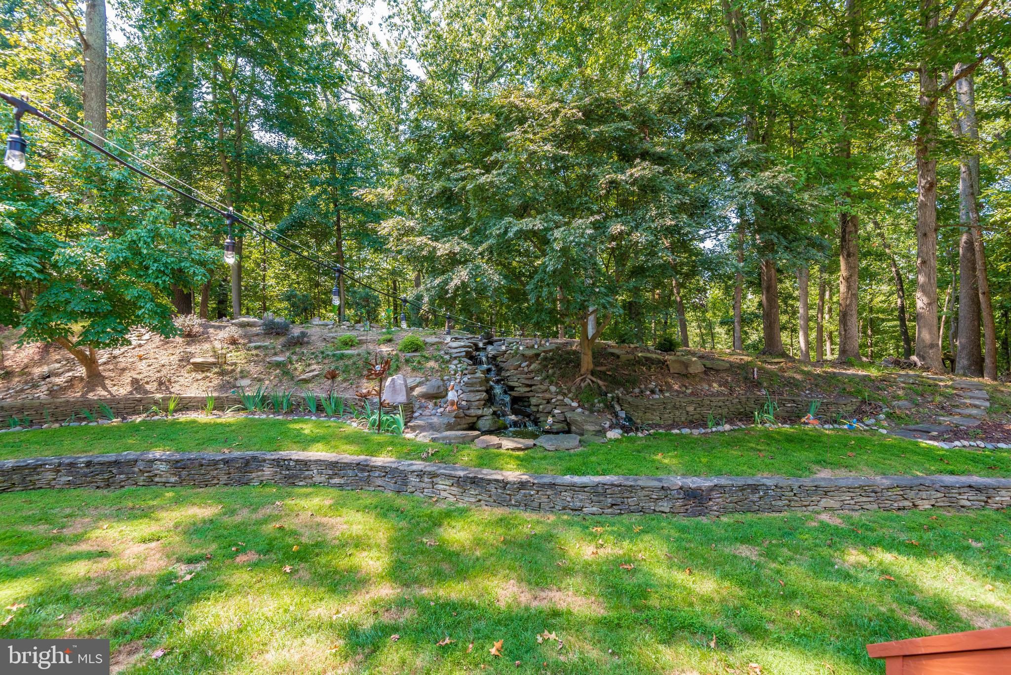 10725 Game Preserve Road Gaithersburg, MD 20879 - Photo 43 of 50 EXTERIOR-ROCK LANDSCAPE IN BACKYARD