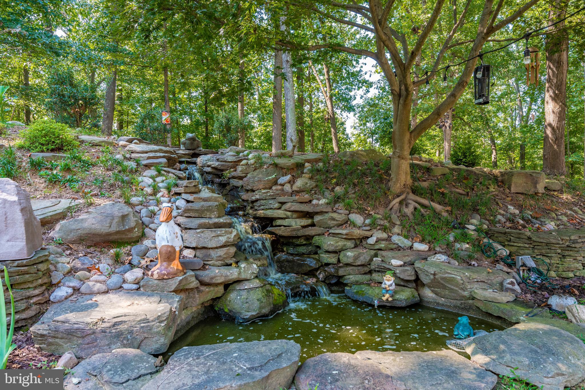 10725 Game Preserve Road Gaithersburg, MD 20879 - Photo 45 of 50 EXTERIOR-ROCK WATERFALL W/ SMALL POND