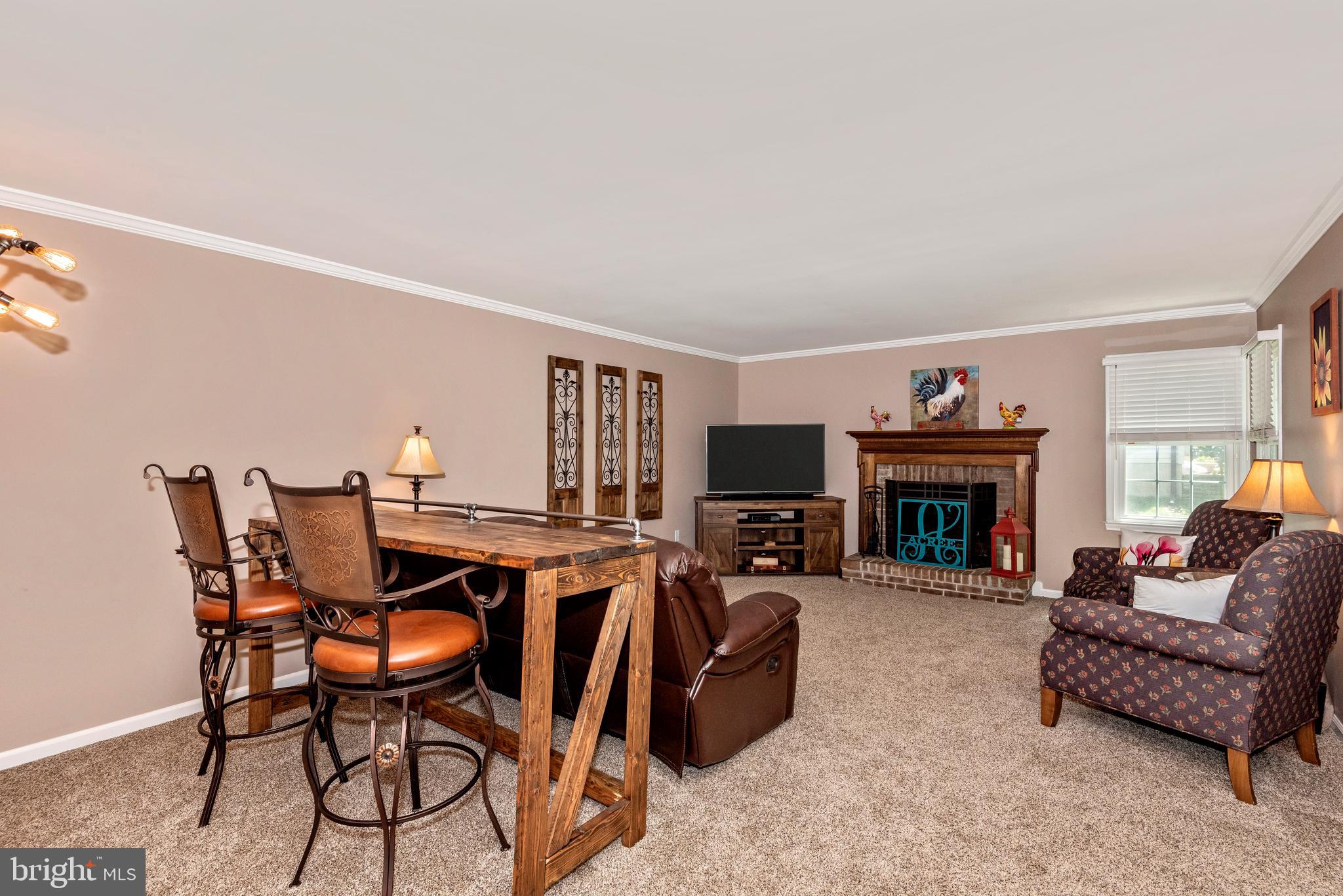 10725 Game Preserve Road Gaithersburg, MD 20879 - Photo 8 of 50 MAIN LEVEL-FAMILY ROOM W/ FIREPLACE