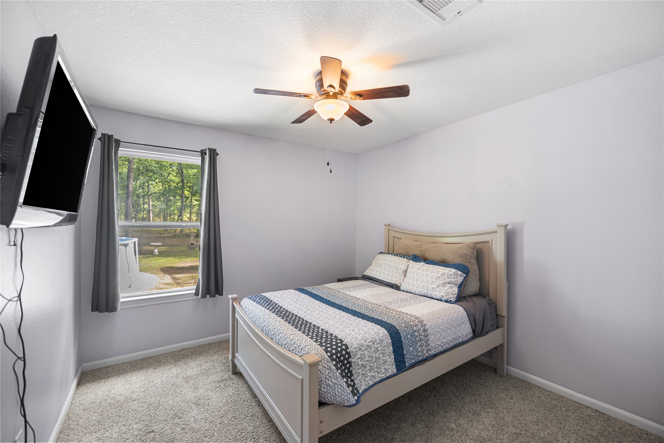 8997 Hickory Road Plantersville, TX 77363 - Photo 21 of 31 secondary bedroom 2