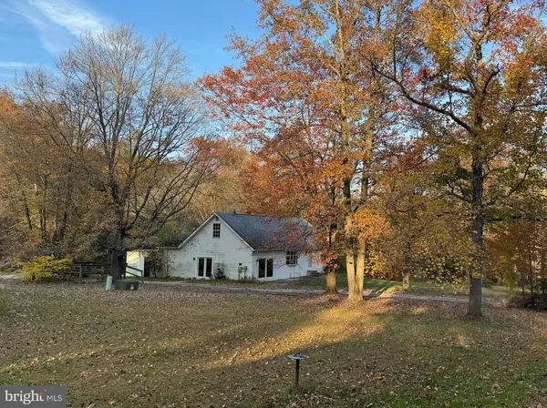 a view of backyard with green space