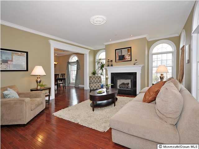 331 Park Avenue Rutherford, NJ 07070 - Photo 3 of 3 a living room with furniture and a fireplace