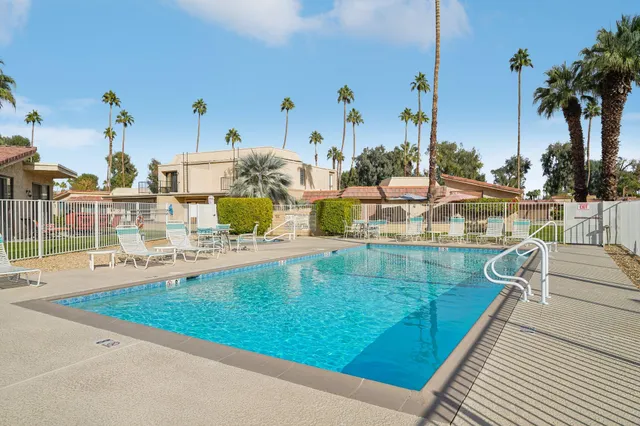 a view of a house with a swimming pool