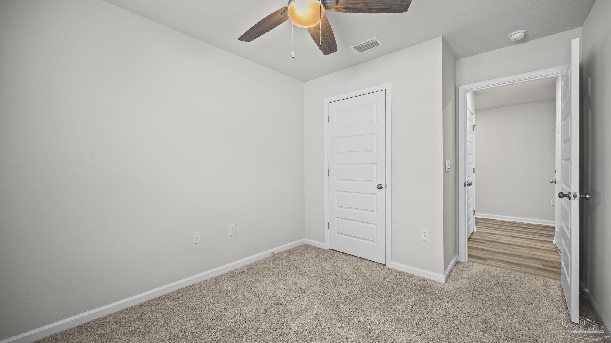 22483 Aleutian Avenue Foley, AL 36535 - Photo 15 of 27 an empty room with staircase