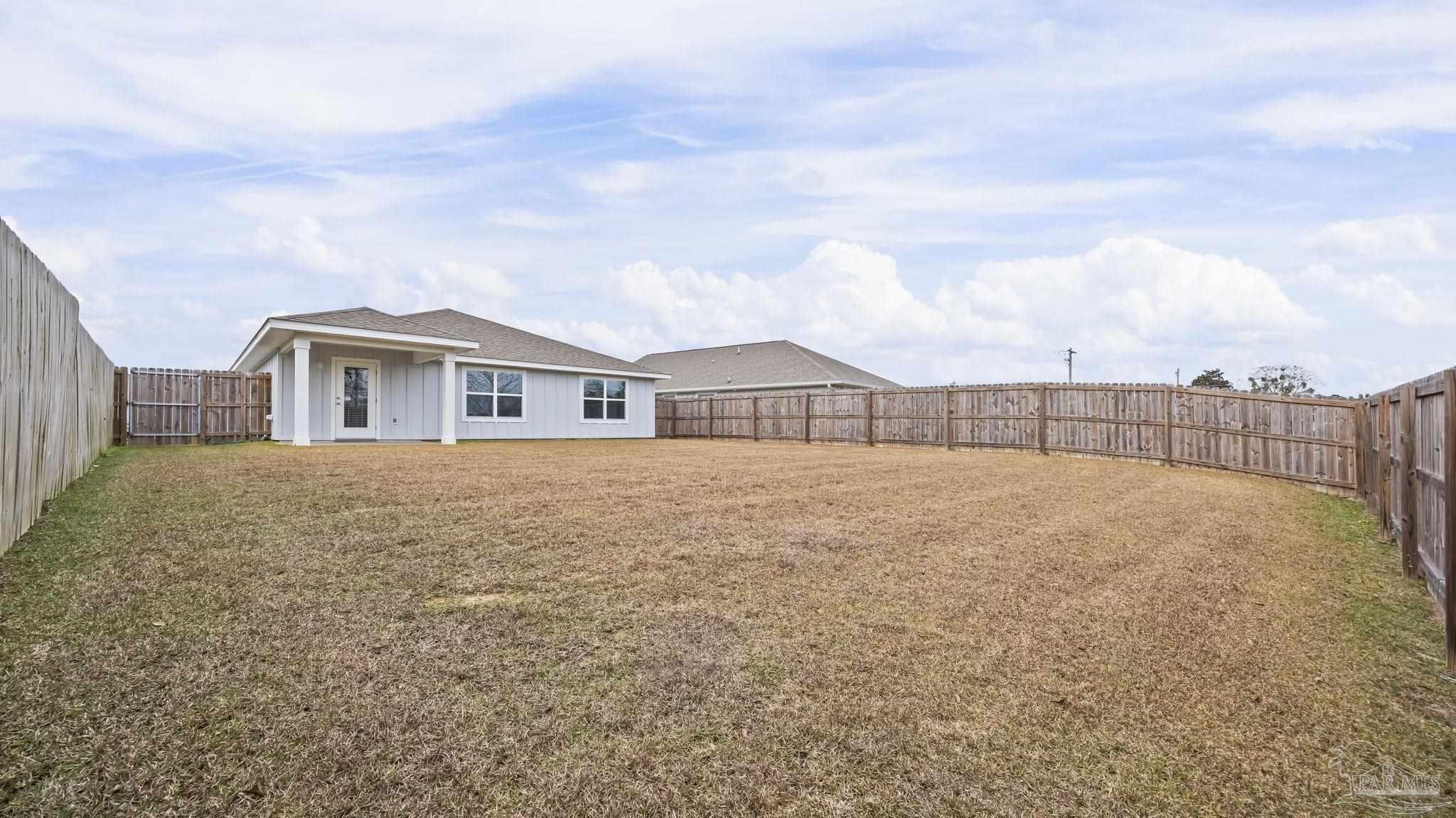 22483 Aleutian Avenue Foley, AL 36535 - Photo 23 of 27 a view of house with backyard