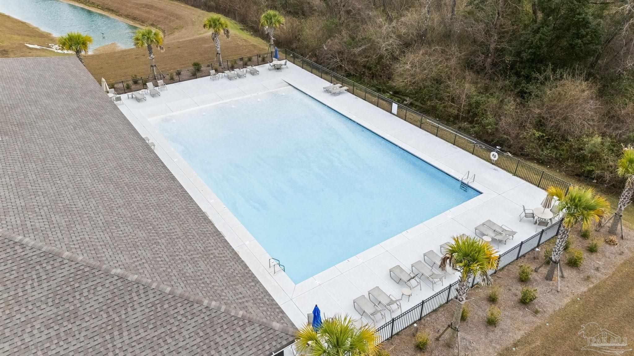 22483 Aleutian Avenue Foley, AL 36535 - Photo 25 of 27 a view of a yard with an outdoor seating