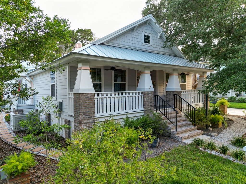 1102 White Street Fernandina Beach, FL 32034 - Photo 1 of 32 front view of a house with a yard