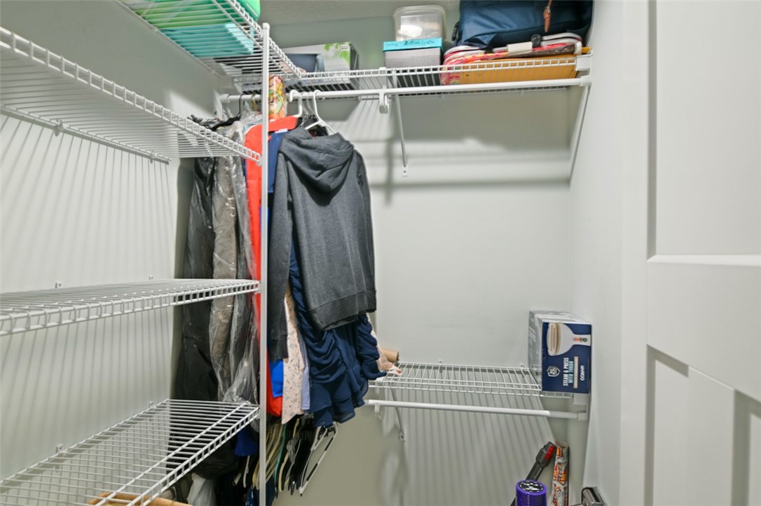 1102 White Street Fernandina Beach, FL 32034 - Photo 14 of 32 a view of walk in closet with clothes and shoes