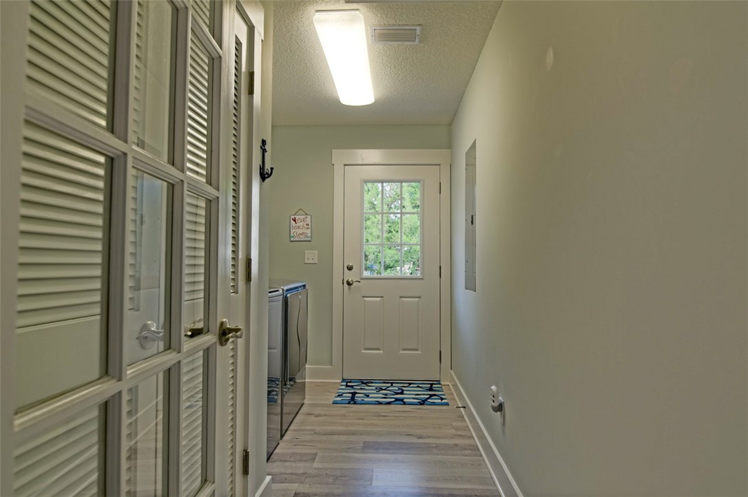 1102 White Street Fernandina Beach, FL 32034 - Photo 17 of 32 a view of a bathroom from the hallway