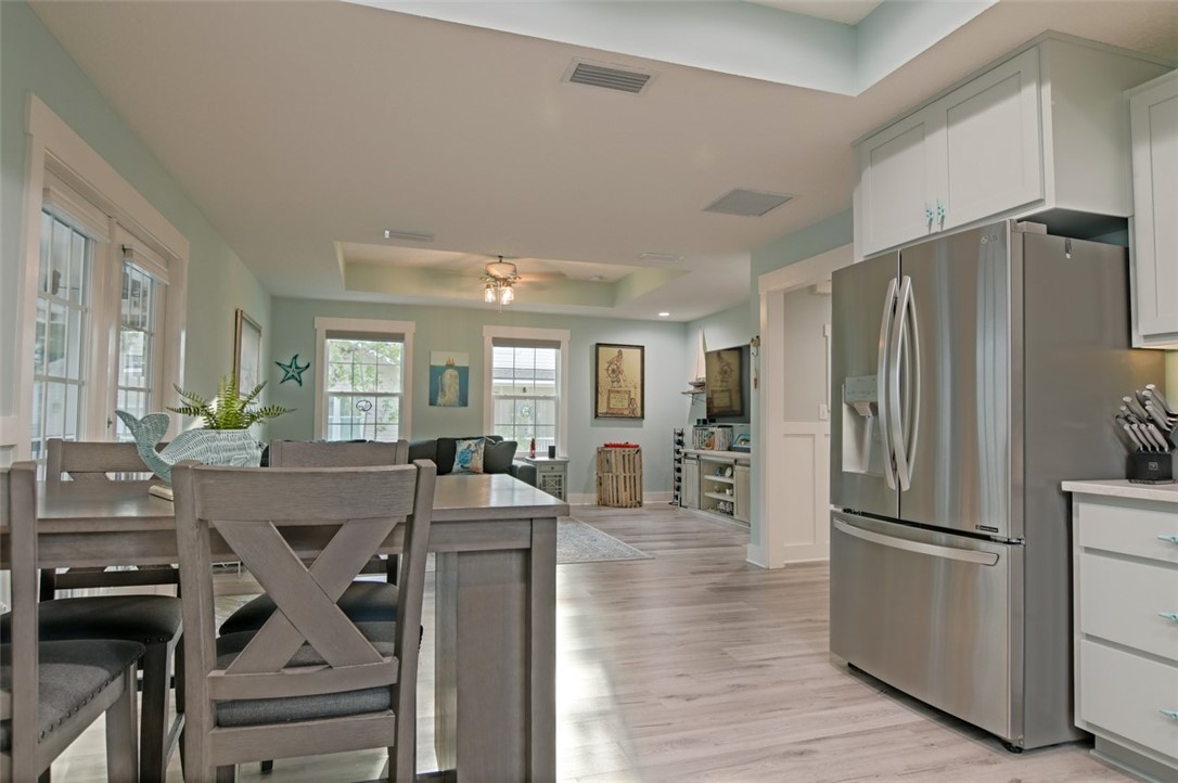 1102 White Street Fernandina Beach, FL 32034 - Photo 20 of 32 a view of kitchen with stainless steel appliances granite countertop a refrigerator and microwave