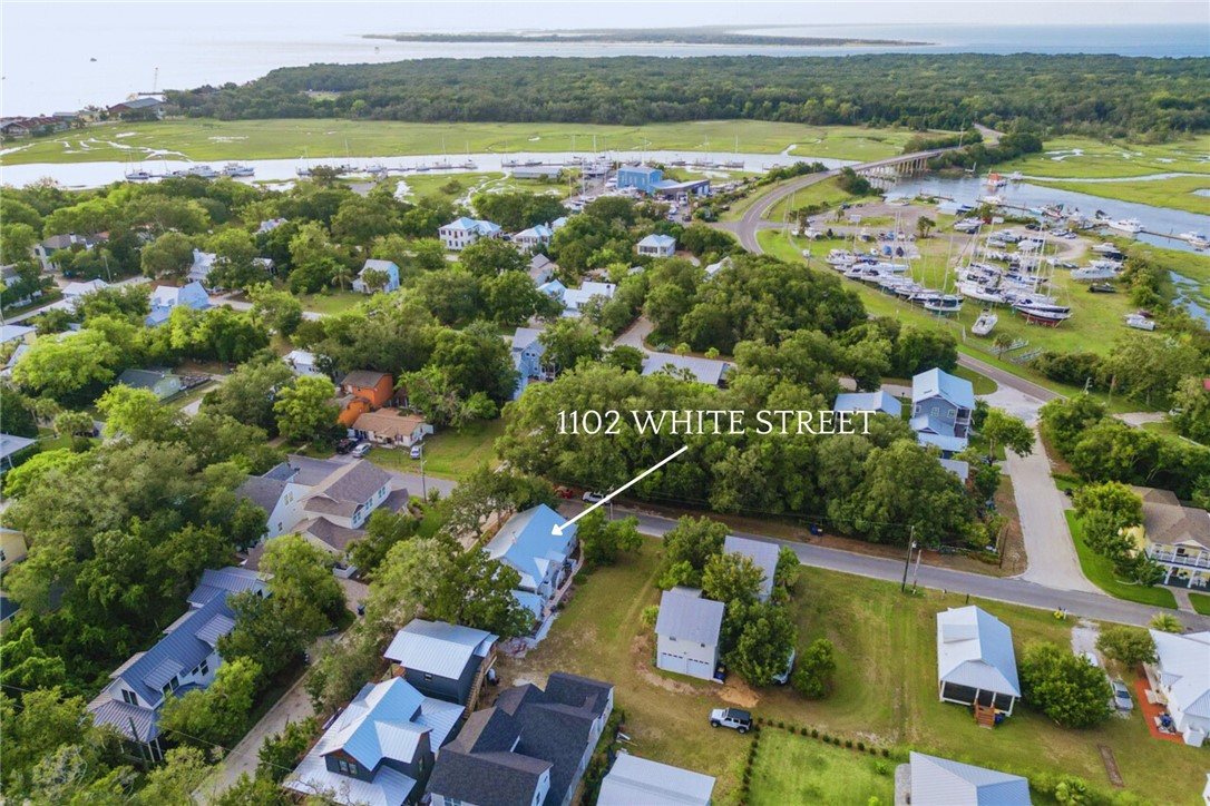 1102 White Street Fernandina Beach, FL 32034 - Photo 2 of 32 an aerial view of residential houses with outdoor space and swimming pool