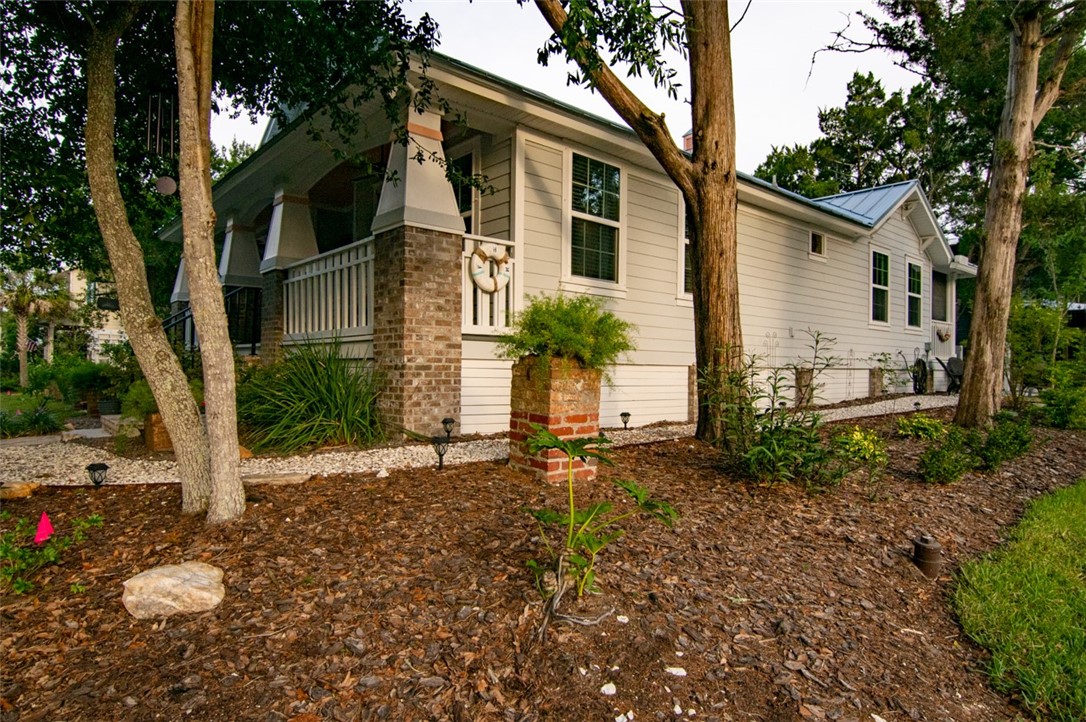 1102 White Street Fernandina Beach, FL 32034 - Photo 27 of 32 a view of a house with a yard