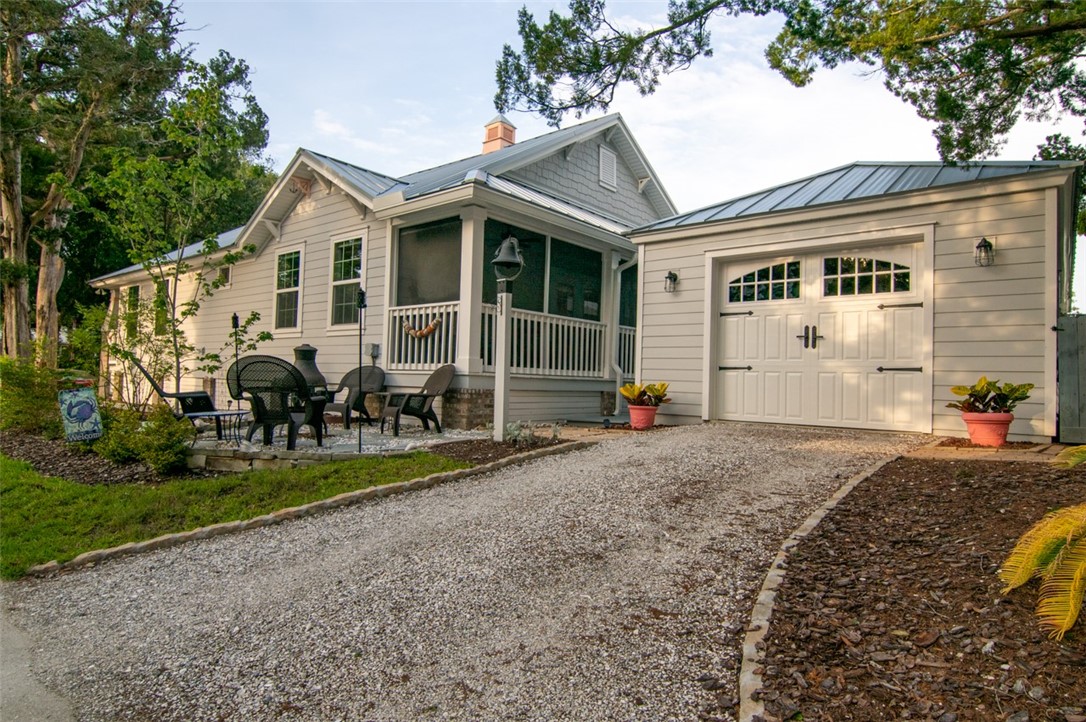 1102 White Street Fernandina Beach, FL 32034 - Photo 29 of 32 a view of a yard in front of a house
