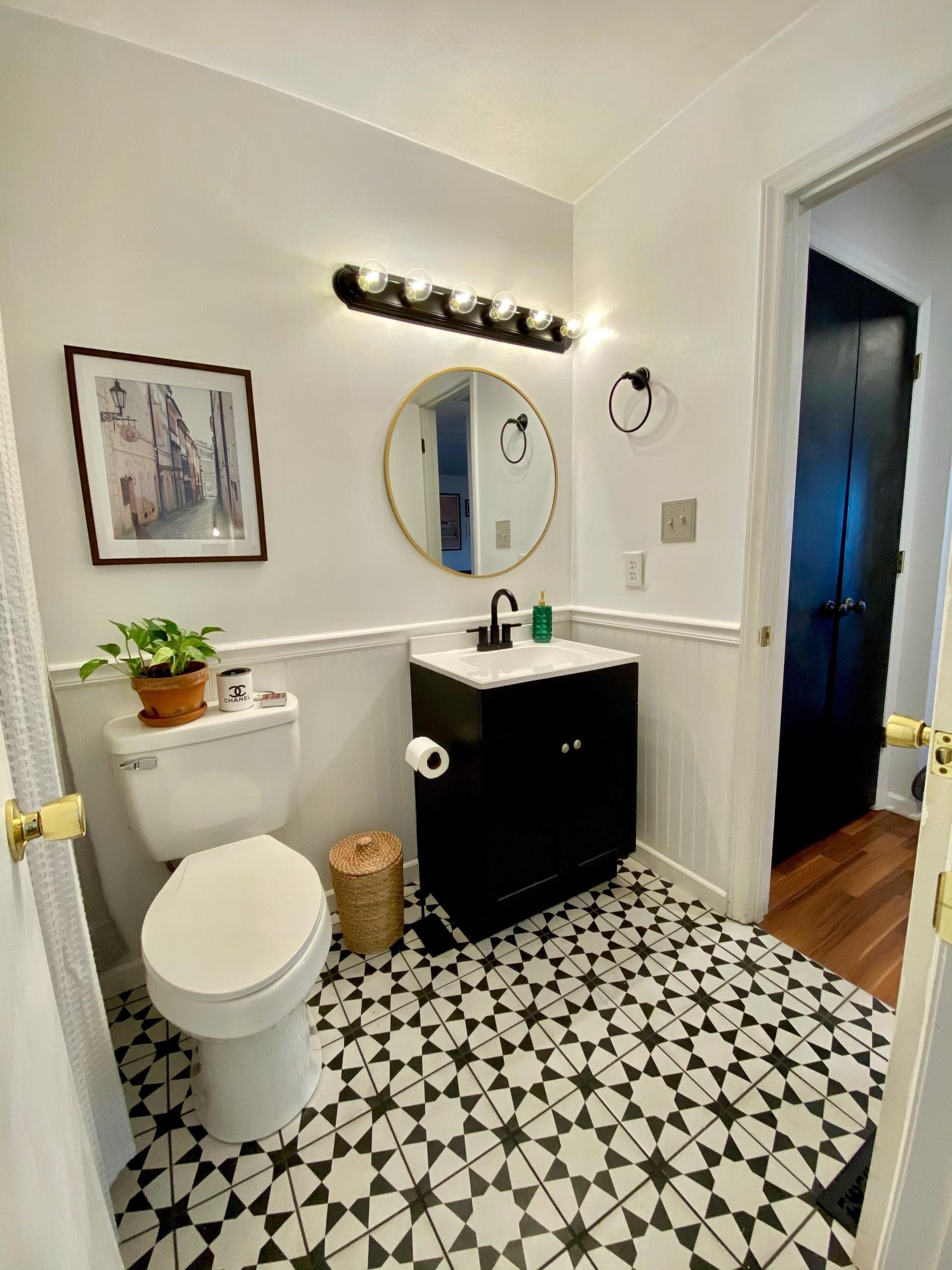 3305 Forest Ridge Road Roanoke, VA 24018 - Photo 17 of 24 a bathroom with a toilet a sink and mirror