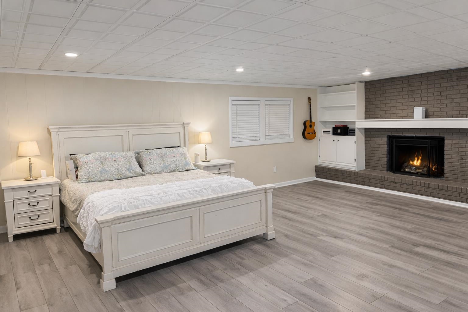 120 Dogwood Trail Ripley, TN 38063 - Photo 17 of 25 a spacious bedroom with a bed and a fireplace