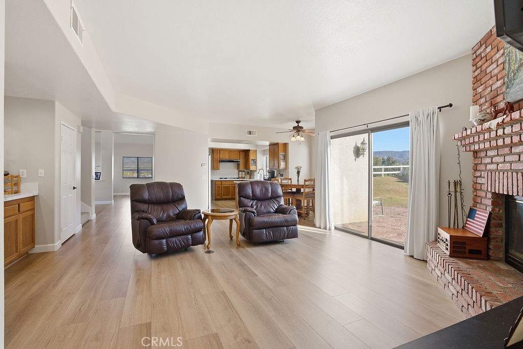2680 Kashmere Canyon Road Acton, CA 93510 - Photo 12 of 60 a living room with furniture and a flat screen tv