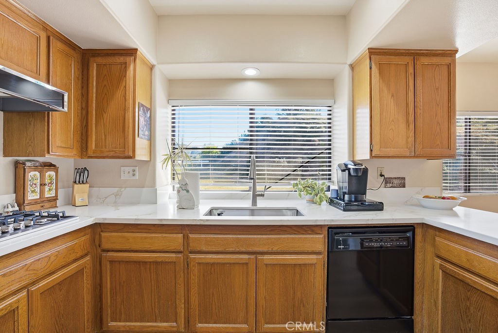 2680 Kashmere Canyon Road Acton, CA 93510 - Photo 15 of 60 a kitchen with stainless steel appliances granite countertop a sink a stove and a microwave