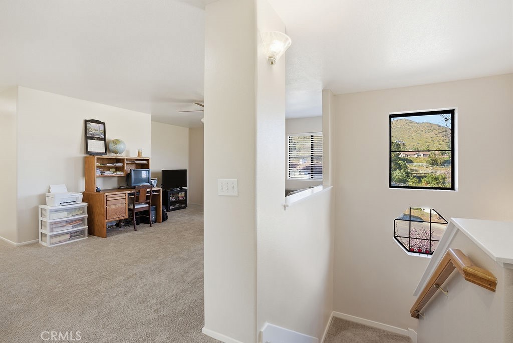 2680 Kashmere Canyon Road Acton, CA 93510 - Photo 22 of 60 a view of a workspace with furniture and a window