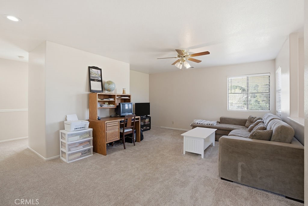 2680 Kashmere Canyon Road Acton, CA 93510 - Photo 25 of 60 a living room with furniture and a ceiling fan