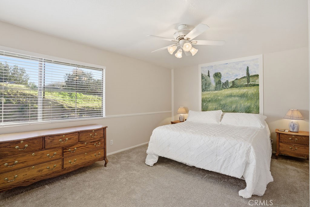 2680 Kashmere Canyon Road Acton, CA 93510 - Photo 33 of 60 a bedroom with a bed dresser and a window
