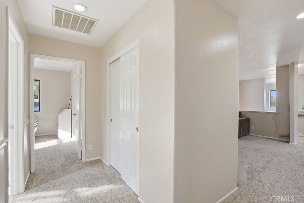 2680 Kashmere Canyon Road Acton, CA 93510 - Photo 37 of 60 a view of a hallway and a livingroom with furniture