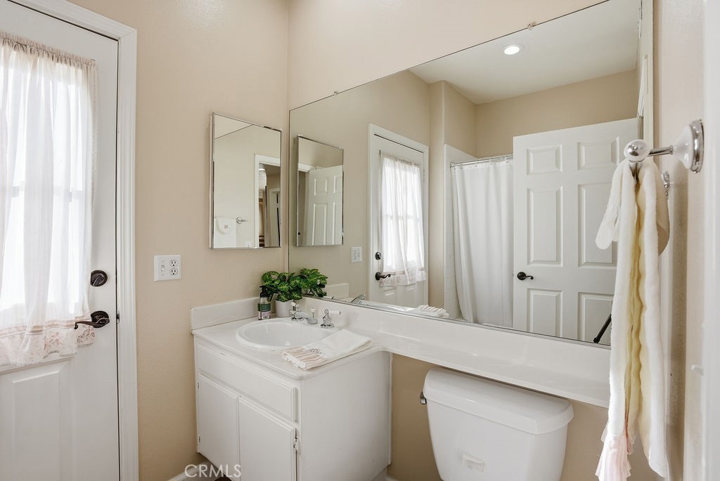 2680 Kashmere Canyon Road Acton, CA 93510 - Photo 38 of 60 a bathroom with a sink a mirror and a shower