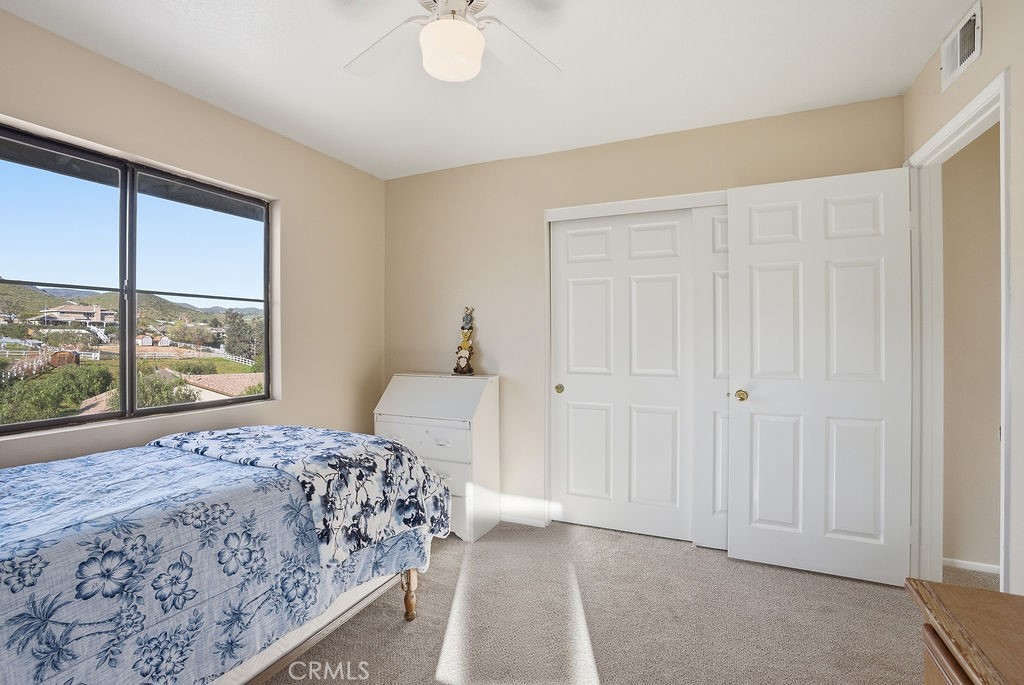 2680 Kashmere Canyon Road Acton, CA 93510 - Photo 39 of 60 a bedroom with a bed and a large window