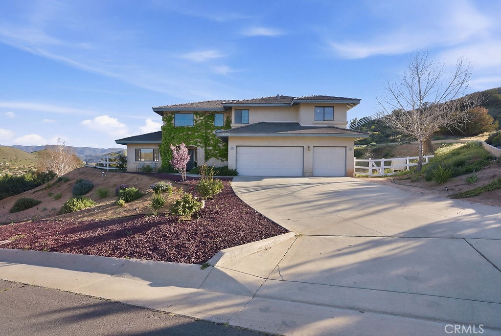 2680 Kashmere Canyon Road Acton, CA 93510 - Photo 5 of 60 a front view of a house with garden