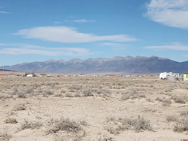 a view of mountain view with trees