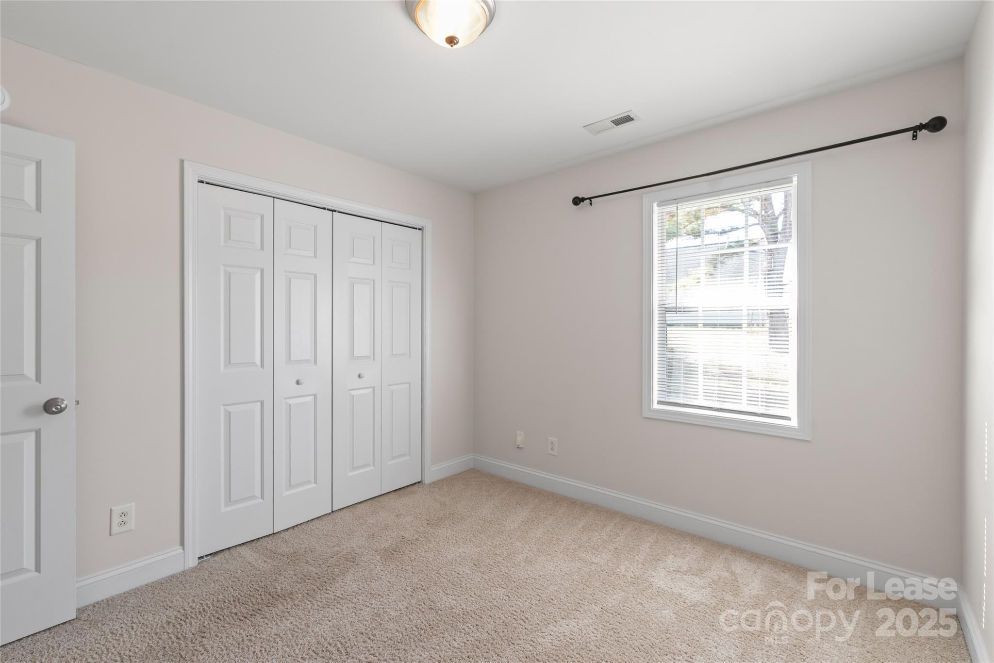 3007 Laurel Creek Lane Monroe, NC 28110 - Photo 18 of 28 a view of an empty room with a window