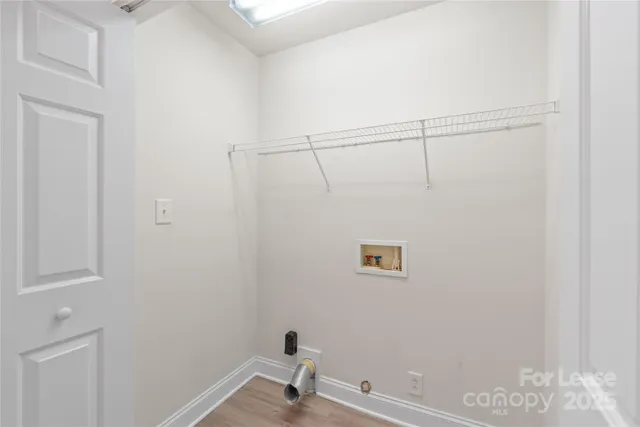 a bathroom with a sink and vanity