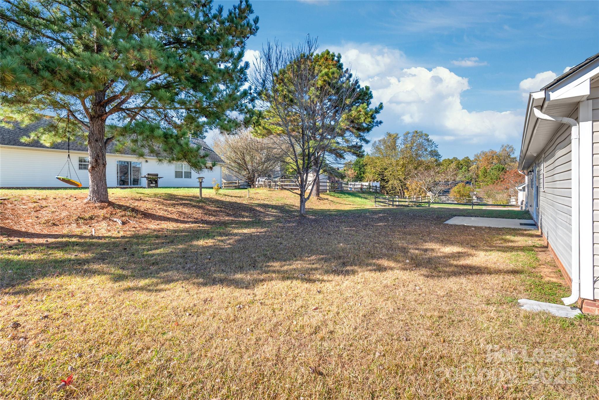 3007 Laurel Creek Lane Monroe, NC 28110 - Photo 23 of 28 a view of a yard with a tree