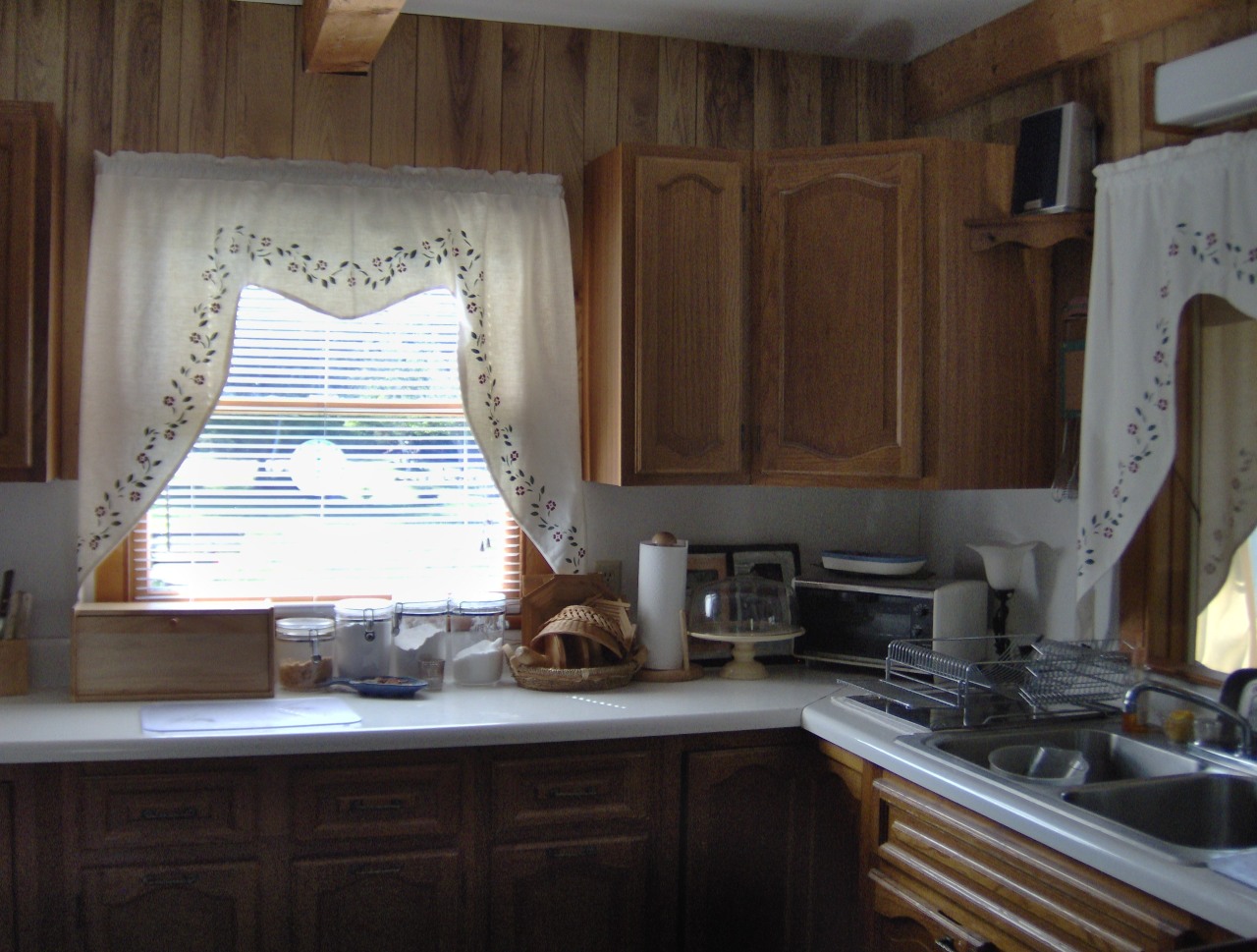 92 Access Road 3 Road, Unit 3 Plainfield, MA 01070 - Photo 12 of 19 a kitchen with stainless steel appliances a sink dishwasher window and cabinets