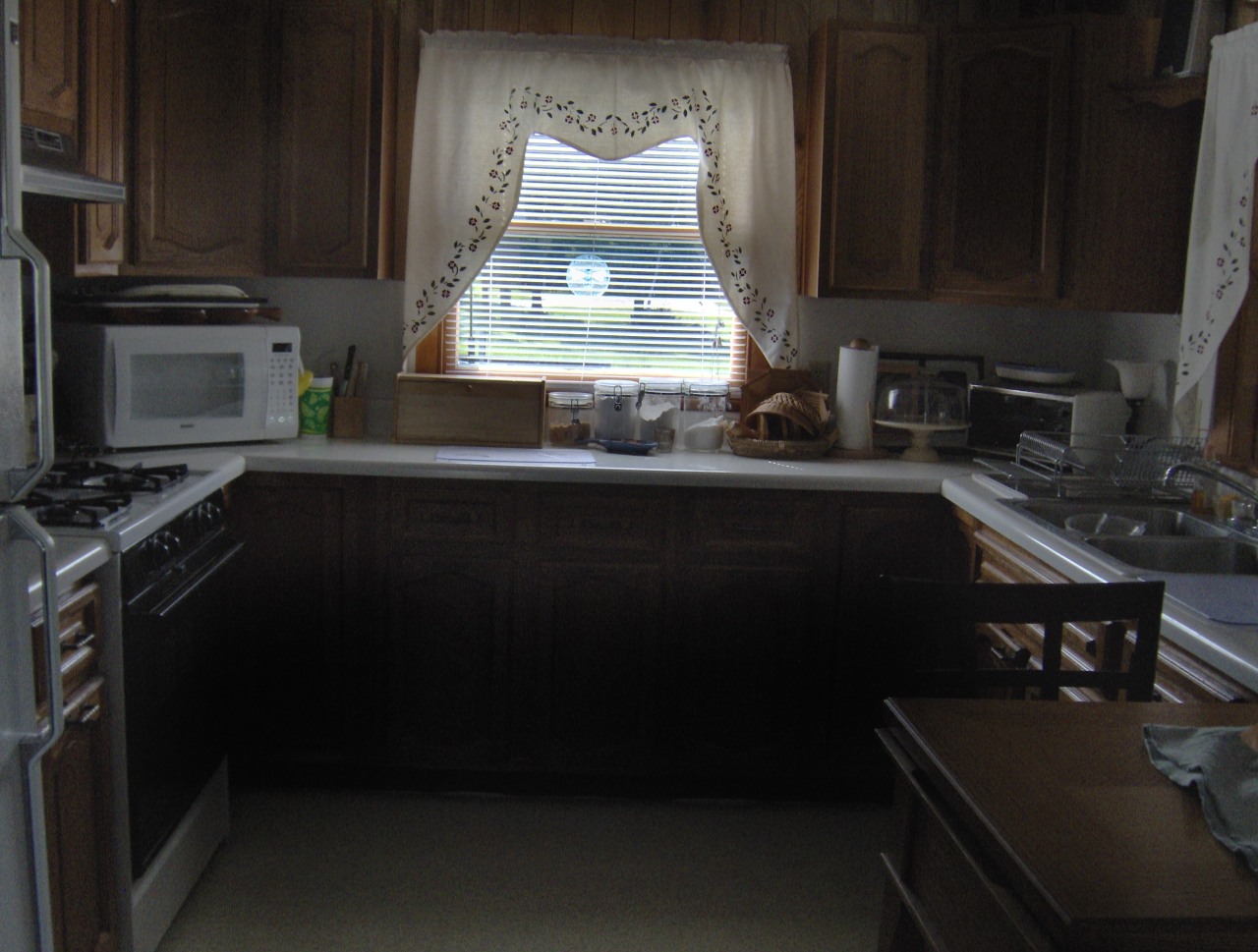 92 Access Road 3 Road, Unit 3 Plainfield, MA 01070 - Photo 13 of 19 a kitchen with a sink a stove and cabinets