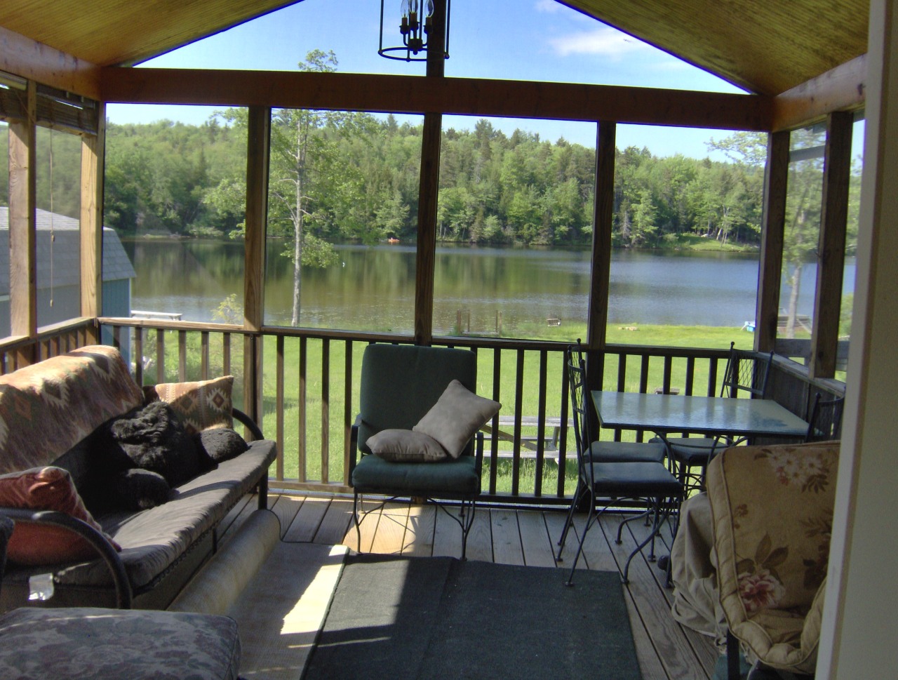 92 Access Road 3 Road, Unit 3 Plainfield, MA 01070 - Photo 7 of 19 a balcony with furniture and garden view