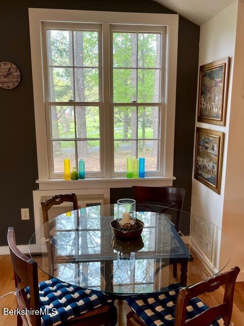 150 Water Farm Road Sheffield, MA 01257 - Photo 12 of 15 a room with lots of furniture and windows