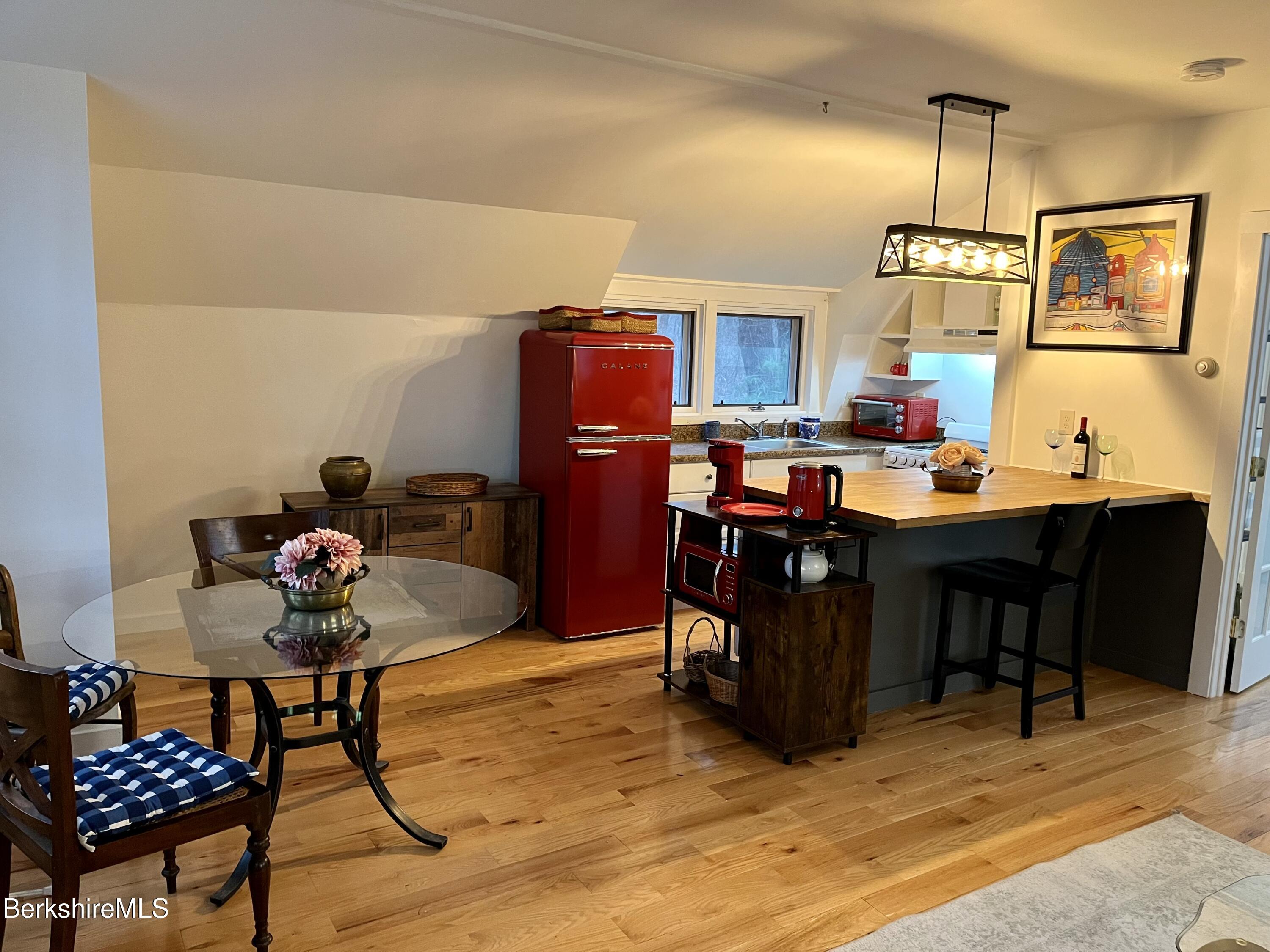 150 Water Farm Road Sheffield, MA 01257 - Photo 7 of 15 a work room with furniture and rug