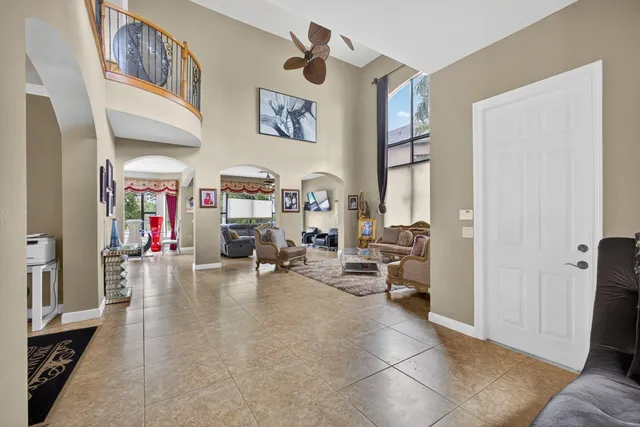 a view of a room with lots of wooden furniture